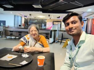 Professional caregiver providing home care assistance to an elderly woman in Kolkata