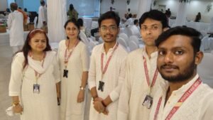 A smiling senior citizen in Kolkata enjoying a conversation with a professional elder care provider.